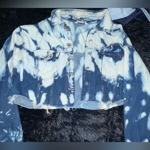 Cropped multi wash denim jacket.
